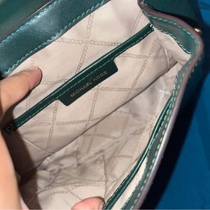 Michael kors mini book bag.